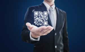 man holding qr code